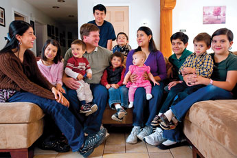 Orin and Shannon Sowers, center, have experienced many different methods with the births of their ten children, Janel, left, Jewel, Japheth, Jared, Jaden, Jed, Jenna, Joel, Jasper and Joy, but were forced to drive to Las Vegas, NM for Jenna's birth after a conflict with RMCH about which method to use. © 2011 Gallup Independent / Cable Hoover 